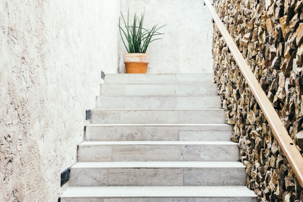 stone wall near stairs